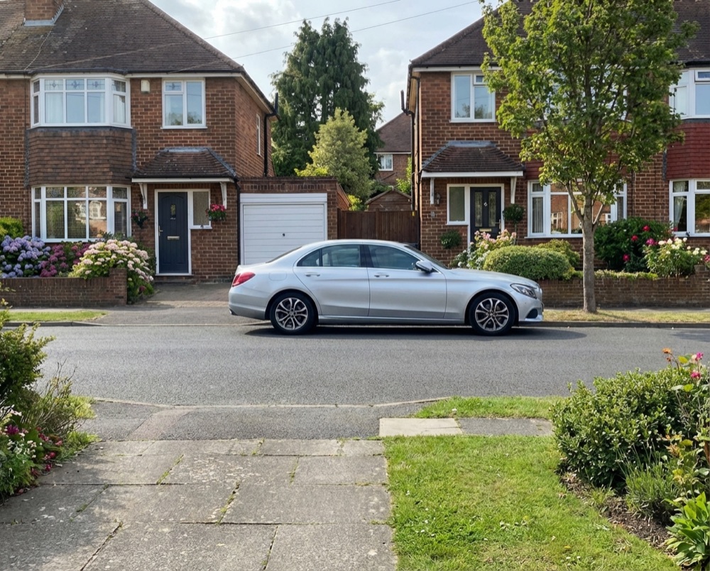 Residential street in Goring-by-Sea with wheelie bins